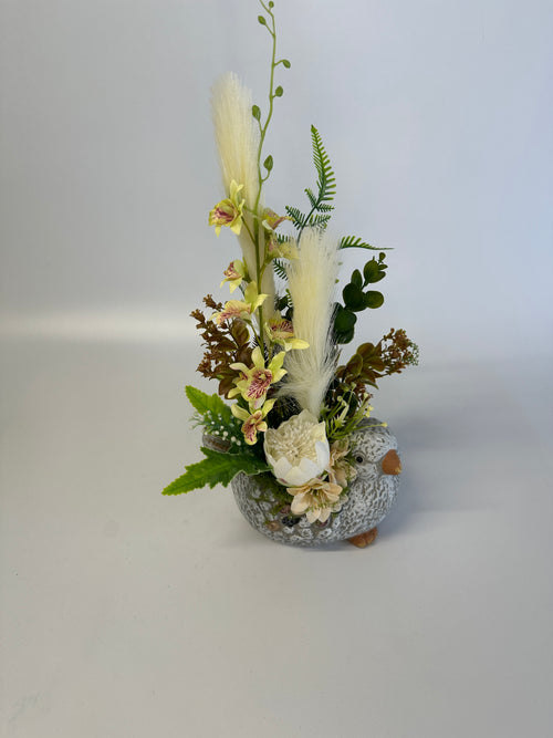 Ceramiczny ptaszek z kwiatami